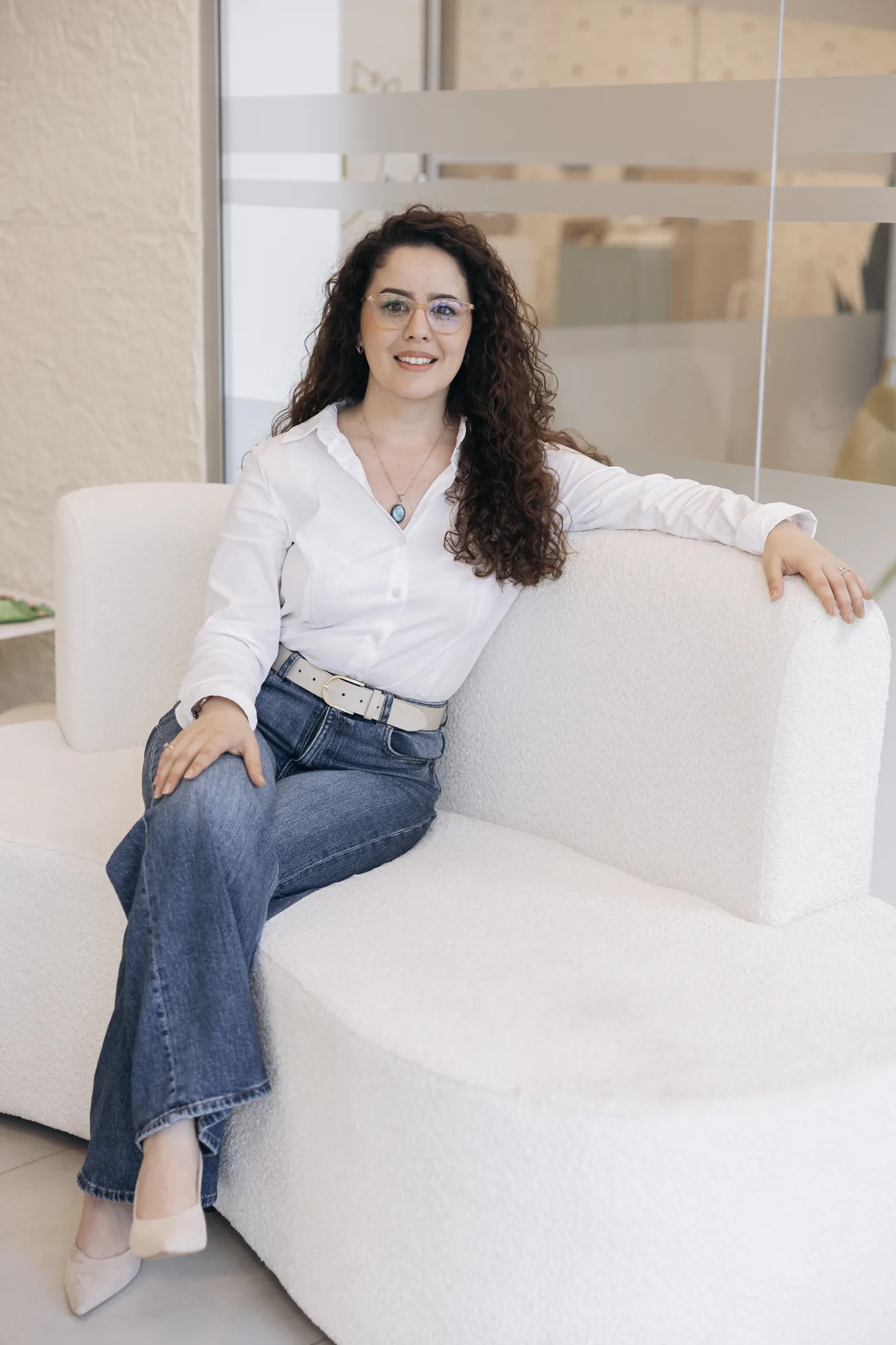 Child psychologist seated in a welcoming consultation room